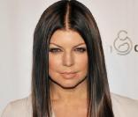 Fergie des Black Eyed Peas en brune piquante lors d'une soirée à New York le 12 mars 2009 