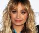 La très fashion Nicole Richie nous démontre encore une fois qu'elle a un pure style ! Brune, rousse et là en l'occurrence blonde, tout lui va !  Le 23 mars 2009 à L.A