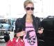 Comment parler de rose sans parler de la Barbie girl Paris Hilton... Sac Vuitton rose et t-shirt accordé, pour une balade à L.A c"est parfait !