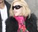 Madonna aussi adopte la pink attitude et porte un châle rose à la sortie du centre de la Kabbale. A New York le 28 février 2009 