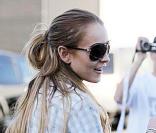 Lindsay Lohan et Samantha Ronson se rendent chez des amis. 28/03/09