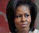 Pendant que la chic Michelle Obama et son époux Barack font leur boulot... dans les rues de Londres, ça chauffe !