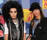 Tom Kaulitz (au centre à droite) des Tokio Hotel, soupçonné d'avoir frappé une fan, fait l'objet d'une enquête