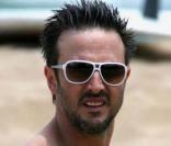 David Arquette : les tatouages, le torse poilu et le maillot tristoune, c'est pas terrible terrible ! Il faudrait revoir le look de ton mari Courteney ! 