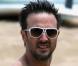 David Arquette : les tatouages, le torse poilu et le maillot tristoune, c'est pas terrible terrible ! Il faudrait revoir le look de ton mari Courteney ! 