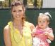 Ali Landry et son adorable fille, lors du 20e Time for Heroes Carnival, pour la recherche contre le sida, à Los Angeles, le 7 juin 2009 !