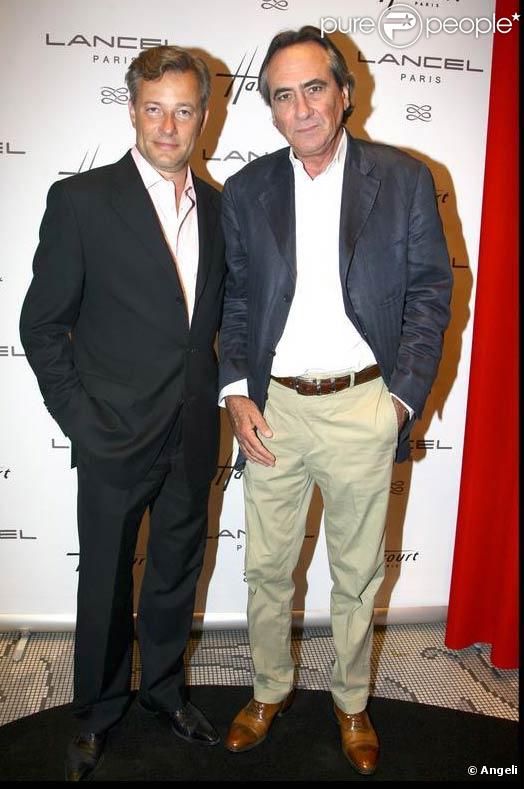 Marc Lelandais et Philippe Lavil à la soirée de vernissage de l'exposition Lancel. 08/09/09