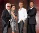 Le jury de X-Factor et le présentateur