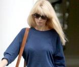 Claudia schiffer à la sortie de l'école de ses enfants le 7/10/09 à Londres