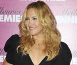 Kate Hudson aime une jolie paire de collants noirs pour habiller ses tenues de soirées. 