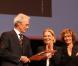 Première édition du Festival de cinéma de Lyon : le 17 octobre 2009, Clint Eastwood a reçu le premier Prix Lumière de l"histoire des mains de Bertrand Tavernier, sous les yeux de Cécile de France 