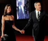 Elisabetta Canalis et George Clooney lors du 4e Festival du film international de Rome le 17 octobre 2009 pour la présentation de Up in the Air : un beau tapis rouge 