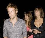 Jenson Button : le champion fête son titre... mais où est sa chérie ?