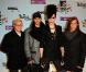 Les Tokio Hotel posent lors du photocall de la cérémonie des MTV EMA"s 2009.