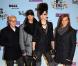 Les Tokio Hotel posent lors du photocall de la cérémonie des MTV EMA"s 2009.