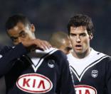 Les Girondins de Bordeaux, pas peu fiers d'avoir gagné leur cinquième match consécutif en Ligue 1, affichent leur joie.  Yoann Gourcuff tombe même le maillot au coup de sifflet final !