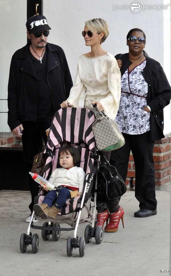 Johnny Hallyday, sa femme Laetitia et leur fille Joy, le 6 janvier 2010 