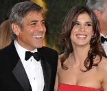 George Clooney et la belle Elisabetta Canalis, à l'occasion du tapis rouge de la 82e cérémonie des Oscars, au Kodak Theatre de Los Angeles, le 7 mars 2010.