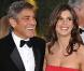 George Clooney et la belle Elisabetta Canalis, à l'occasion du tapis rouge de la 82e cérémonie des Oscars, au Kodak Theatre de Los Angeles, le 7 mars 2010.