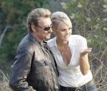 Johnny Hallyday sur le tournage d'une publicité pour Optic 2000, au côté de son épouse Laeticia 