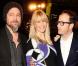 Brad Pitt, Claudia Schiffer et Matthew Vaughn à l'occasion de l'avant-première de  Kick-Ass , qui s'est tenue à l'Empire Cinema de Leicester Square, à Londres, le 22 mars 2010.