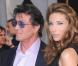 Sylvester Stallone et Jennifer Flavin, à l'occasion de l'avant-première américaine d' Iron Man 2 , qui s'est tenue au El Capitan Theatre d'Hollywood, à Los Angeles, le 26 avril 2010.