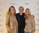 Jean-Claude Darmon entouré par Julie Gayet et Natty Belmondo lors du lancement de la collection Stone pour Bonpoint, le 7 septembre 2010, avenue Montaigne.