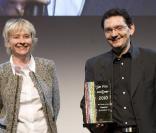 Bénédicte Lesage et Ariel Askenazy lors du Prix du producteur français de télévision à Paris le 6 décembre 2010 dans la somptueuse salle Wagram