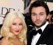 Christina Aguilera et Matthew Rutler à l'occasion de la 68e cérémonie des Golden Globes, qui s'est tenue au Beverly Hilton Hotel de Los Angeles, le 16 janvier 2011.