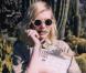 Kirsten Dunst, égérie de la marque Band of outsiders pour la collection printemps-été 2011.