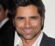 John Stamos, sexy sur tapis rouge.