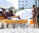 Serena Williams sur la plage à Miami, avec une amie, le 4 avril 2011