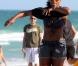 Serena Williams sur la plage à Miami, avec une amie, le 4 avril 2011