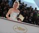 Kirsten Dunst lors de la séance photo post-palmarès du festival de Cannes le 22 mai 2011