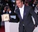 Jean Dujardin lors de la séance photo post-palmarès du festival de Cannes le 22 mai 2011