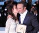 Jean Dujardin et Bérénice Bejo lors de la séance photo post-palmarès du festival de Cannes le 22 mai 2011