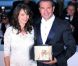 Jean Dujardin et Bérénice Bejo lors de la séance photo post-palmarès du festival de Cannes le 22 mai 2011