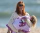 Marcia Cross en famille à la plage à Santa Monica le 30 mai 2011. Elle profite du soleil avec ses jumelles Savannah et Eden et son mari Tom Mahoney.