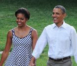 Michelle et Barack Obama dans les jardins de la Maison Blanche le 15 juin 2011 pour un pique-nique du Congrés.
