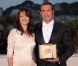 Bérénice Bejo et Jean Dujardin après la cérémonie de clôture du festival de Cannes, le 22 mai 2011.