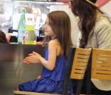Suri Cruise et Katie Holmes en balade shopping à Miami en juin 2011