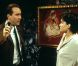 Carla Gugino dans Snake Eyes, face à Nicolas Cage
