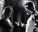 Carla Gugino tout à fait sublimée en noir et blanc dans Sin City face à Mickey Rourke