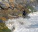 Les parents de Victoria Beckham regardent leur petit fils Brooklyn faire du surf à Malibu le 19 juillet 2011