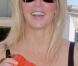 PHOTOS : Heather Locklear : son accessoire préféré !