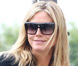 Heidi Klum va chercher son fils Henry à son cours de karaté tout en portant sa fille Lou endormie dans ses bras ! Los Angeles, 17 septembre 2011