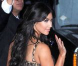 C'est une superbe Kim Kardashian qui a été aperçue à New York, sublimée par une robe léopard de sa propre ligne de vêtements, Kardashian Kollection. Le 18 septembre 2011.   
