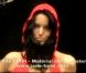 Jade Foret et sa combi rouge lors de la performance de sa chanson "Material Girl" en Belgique