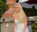 Lindsay Lohan et sa longue robe le 25 septembre 2011 sur le lac de Côme en Italie, lors du shooting avec Philipp Plein