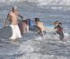David Beckham et ses enfants Brooklyn, Romeo et Cruz sur la plage de Malibu le 27 août 2011